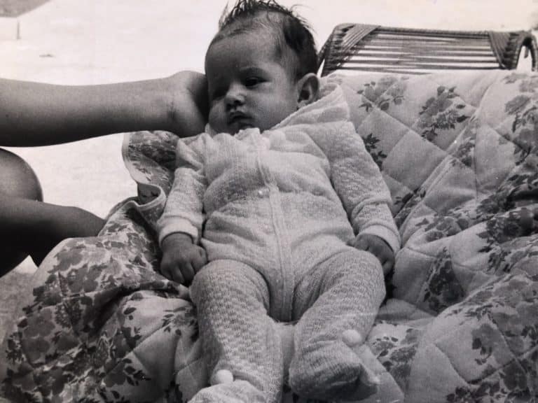 Rosmary WISS' als 8 Monate altes Baby auf einer Decke, 1974